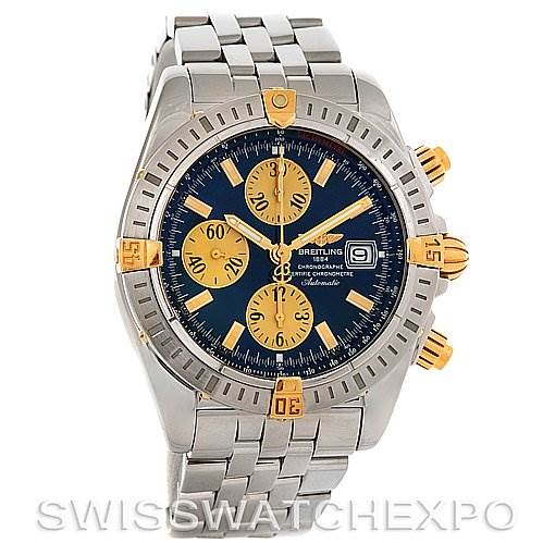 The image shows a front view of a Breitling Chronomat B1335611 Men's Steel and Gold (two tone) Blue Dial B1335611 Men's Steel and Gold (two tone) Blue Dial watch, highlighting its dial, subdials, bezel, and bracelet.