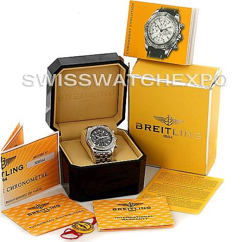 The image shows a Breitling Chronomat A1335611/F517 Men's Stainless Steel Grey Dial A1335611/F517 Men's Stainless Steel Grey Dial watch in its box, accompanied by manuals, tags, and the outer packaging.