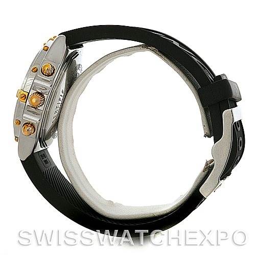 The image shows a side view of a Breitling Chronomat B13350 Men's Steel and Gold (two tone) Black Dial B13350 Men's Steel and Gold (two tone) Black Dial watch, highlighting its case, pushers, and rubber strap.