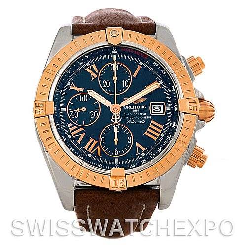 The image shows a front view of a Breitling Chronomat C13356 Men's Steel and Gold (two tone) Blue Dial C13356 Men's Steel and Gold (two tone) Blue Dial watch with a leather strap, displaying its dial, bezel, and pushers.