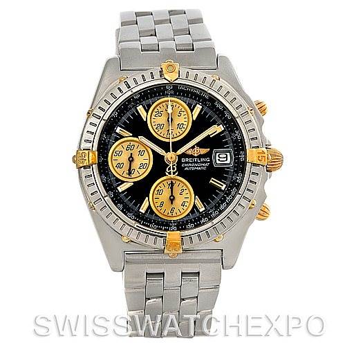 The image shows a top-down view of a Breitling Chronomat B13050 Men
s Steel and Gold (two tone) Black Dial B13050 Men
s Steel and Gold (two tone) Black Dial watch displaying the dial, bezel, and part of the metal bracelet.