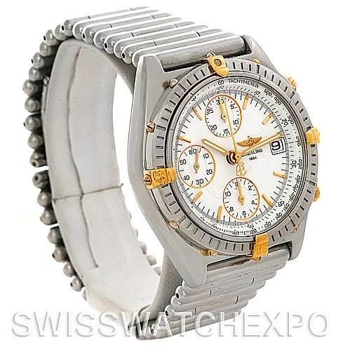 The Breitling Chronomat B13050 Men's Steel and Gold (two tone) White Dial B13050 Men's Steel and Gold (two tone) White Dial watch is shown at a slight angle, highlighting its face, bezel, chronograph sub-dials, and bracelet.