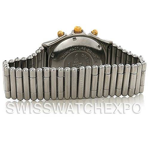 The image shows the back case and metal bracelet of a Breitling Chronomat B13050 Men's Steel and Gold (two tone) White Dial B13050 Men's Steel and Gold (two tone) White Dial watch, emphasizing the watch's clasp and bracelet links.
