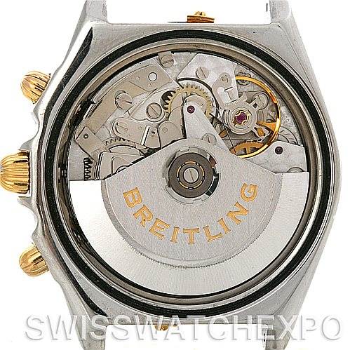 This image shows the back view of the Breitling Chronomat B13050 Men's Steel and Gold (two tone) White Dial B13050 Men's Steel and Gold (two tone) White Dial watch, revealing its intricate automatic movement and rotor.