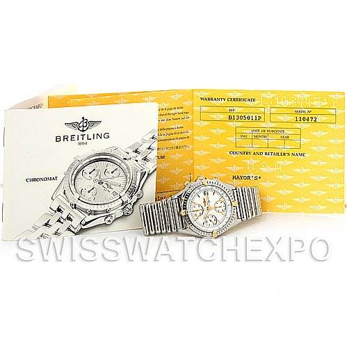 The image shows a Breitling Chronomat B13050 Men's Steel and Gold (two tone) White Dial B13050 Men's Steel and Gold (two tone) White Dial watch, its warranty certificate, and a user manual from a top-down angle.