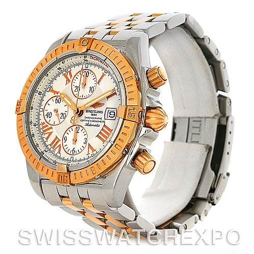 The image shows a Breitling Chronomat C13356 Men's Steel and Gold (two tone) White Dial C13356 Men's Steel and Gold (two tone) White Dial watch at a side angle, highlighting the face, bezel, crown, chronograph buttons, and bracelet.