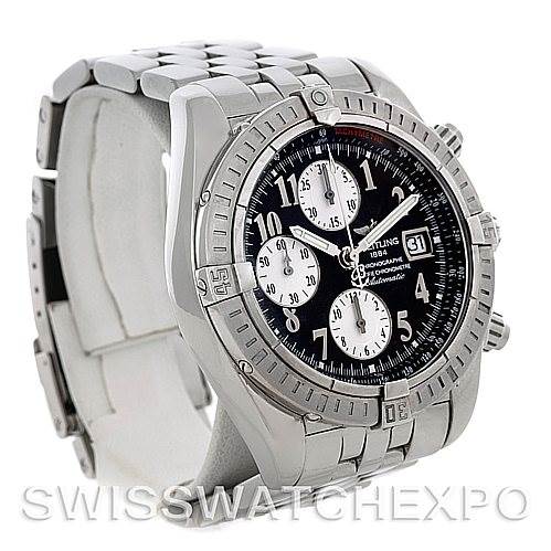 The image shows a side angle of the Breitling Chronomat A13356 Men's Stainless Steel Black Dial A13356 Men's Stainless Steel Black Dial watch, showcasing its stainless steel bracelet, bezel, and black dial with sub-dials.