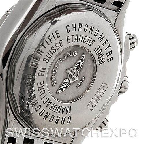This image shows the case back and part of the crown of a Breitling Chronomat A13356 Men's Stainless Steel Black Dial A13356 Men's Stainless Steel Black Dial watch, highlighting its engravings and features.