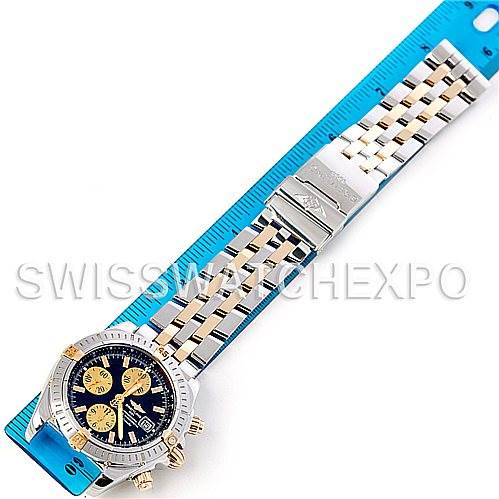 The image shows a top-down view of a Breitling Chronomat B13356 Men's Steel and Gold (two tone) Black Dial B13356 Men's Steel and Gold (two tone) Black Dial watch, displaying the entire watch including the band and face.