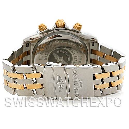 This image shows the back, crown, and part of the bracelet of the Breitling Chronomat B13356 Men's Steel and Gold (two tone) Black Dial B13356 Men's Steel and Gold (two tone) Black Dial watch, featuring a two-tone metal bracelet.