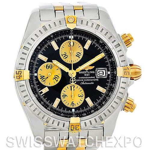 This image shows a front view of a Breitling Chronomat B13356 Men's Steel and Gold (two tone) Black Dial B13356 Men's Steel and Gold (two tone) Black Dial watch, highlighting the dial, subdials, bezel, crown, and pushers.