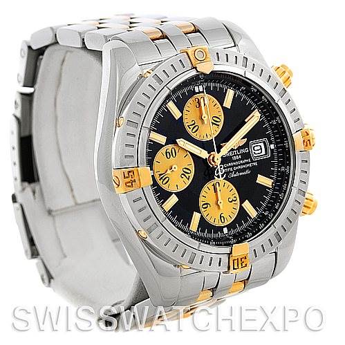The image shows a Breitling Chronomat B13356 Men's Steel and Gold (two tone) Black Dial B13356 Men's Steel and Gold (two tone) Black Dial watch at a three-quarter angle, highlighting the bezel, dial, subdials, and bracelet.
