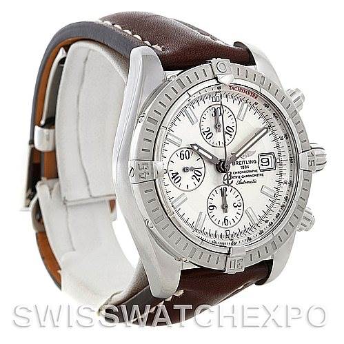 The image shows a Breitling Chronomat A13356 Men's Stainless Steel Silver Dial A13356 Men's Stainless Steel Silver Dial watch at an angled side view, highlighting the dial, bezel, and leather strap.