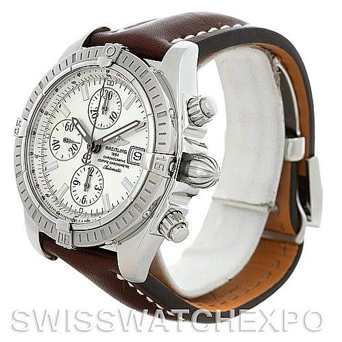The image shows a Breitling Chronomat A13356 Men's Stainless Steel Silver Dial A13356 Men's Stainless Steel Silver Dial watch at a three-quarter angle, highlighting the face, bezel, crowns, and leather strap.