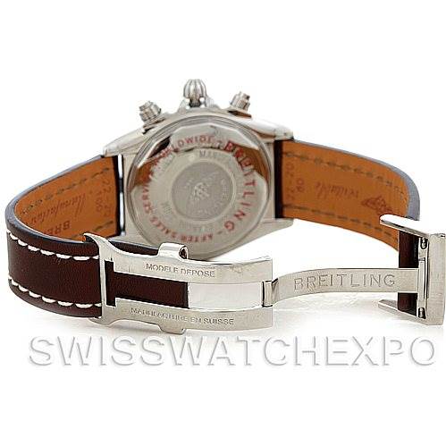 This image shows the back view of a Breitling Chronomat A13356 Men's Stainless Steel Silver Dial A13356 Men's Stainless Steel Silver Dial watch, highlighting the leather strap and engraved clasp.