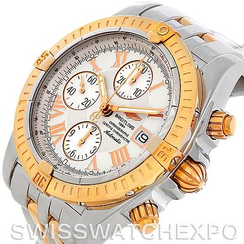 The image shows a Breitling Chronomat C13356 Men's Steel and Gold (two tone) White Dial C13356 Men's Steel and Gold (two tone) White Dial watch at an angle highlighting the face and side, showcasing its two-tone design.