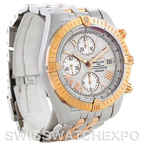 The image shows a side and front angled view of a Breitling Chronomat C13356 Men's Steel and Gold (two tone) White Dial C13356 Men's Steel and Gold (two tone) White Dial watch, highlighting its two-tone bezel and bracelet.
