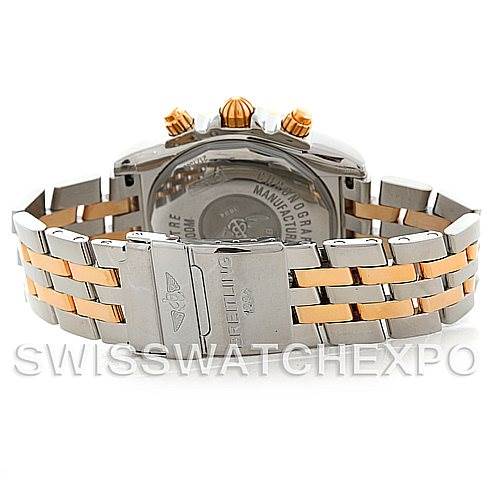 The image shows the back view of a Breitling Chronomat C13356 Men's Steel and Gold (two tone) White Dial C13356 Men's Steel and Gold (two tone) White Dial watch, highlighting its case back and two-tone metal bracelet.