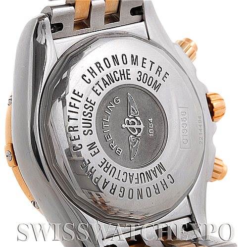 The image shows the back view of a Breitling Chronomat C13356 Men's Steel and Gold (two tone) Mother of Pearl Dial C13356 Men's Steel and Gold (two tone) Mother of Pearl Dial watch, highlighting the case back and parts of the bracelet and crown.