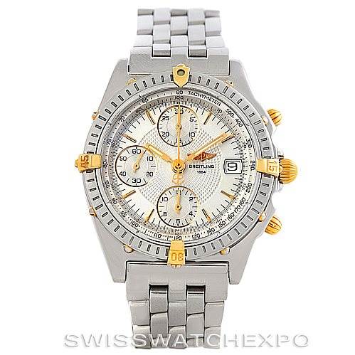 The image shows a Breitling Chronomat B13050 Men's Steel and Gold (two tone) White Dial B13050 Men's Steel and Gold (two tone) White Dial watch front view, highlighting the dial, bezel, subdials, crown, and bracelet.