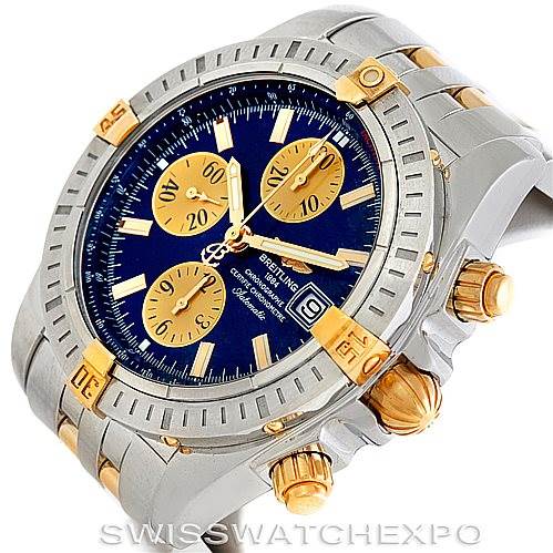 This image shows a Breitling Chronomat B13356 Men
s Steel and Gold (two tone) Blue Dial B13356 Men
s Steel and Gold (two tone) Blue Dial watch at an angled side view, highlighting the dial, pushers, crown, and band.
