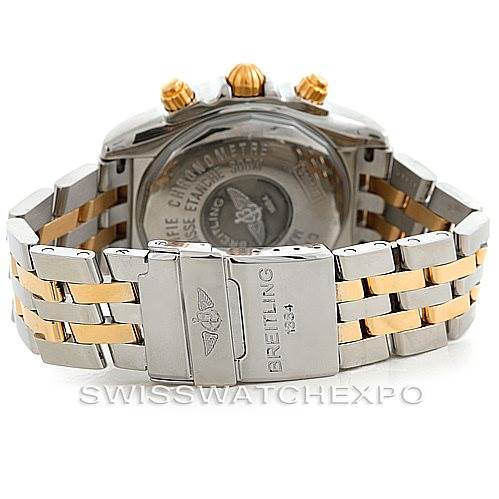 The image shows the back view of a Breitling Chronomat B13356 Men
s Steel and Gold (two tone) Blue Dial B13356 Men
s Steel and Gold (two tone) Blue Dial watch, highlighting the clasp, case back, and bracelet with gold accents.