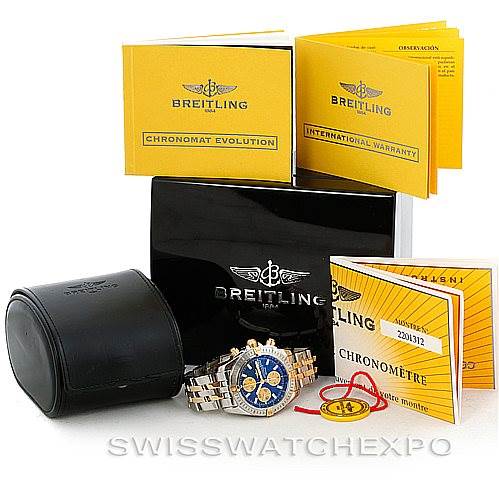 The image shows a Breitling Chronomat B13356 Men
s Steel and Gold (two tone) Blue Dial B13356 Men
s Steel and Gold (two tone) Blue Dial model watch, including its box, leather case, warranty booklets, and chronometer certificate.