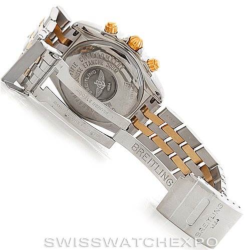 The image shows the back case and bracelet of a Breitling Chronomat B13356 Men
s Steel and Gold (two tone) Blue Dial B13356 Men
s Steel and Gold (two tone) Blue Dial watch, focusing on the clasp and engraved details.