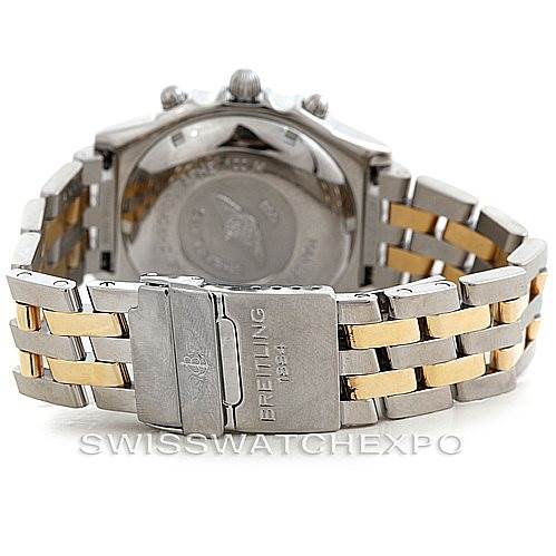 This image shows the back view of a Breitling Chronomat D13050 Men's Stainless Steel Blue Dial D13050 Men's Stainless Steel Blue Dial watch, highlighting the stainless steel and gold-tone bracelet and clasp.