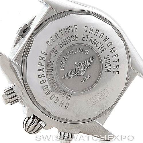 The image shows the case back and crown of a Breitling Chronomat A13356 Men
s Stainless Steel Black Dial A13356 Men
s Stainless Steel Black Dial watch, highlighting its engravings and logo.