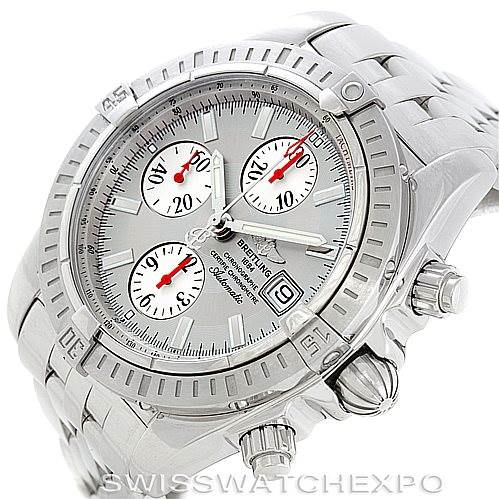 This Breitling Chronomat A13356 Men's Stainless Steel Silver Dial A13356 Men's Stainless Steel Silver Dial watch is shown at a three-quarter angle, highlighting its silver dial, chronographs, date display, and stainless steel bracelet.