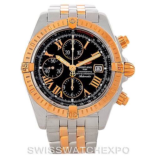 The image shows a front view of the Breitling Chronomat C13356 Men's Steel and Gold (two tone) Black Dial C13356 Men's Steel and Gold (two tone) Black Dial watch, highlighting its two-tone band, bezel, chronograph sub-dials, and date window.