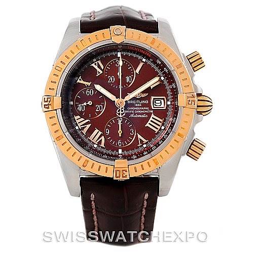 The image shows a front view of a Breitling Chronomat C13356 Men's Steel and Gold (two tone) Burgundy Dial C13356 Men's Steel and Gold (two tone) Burgundy Dial watch, highlighting the gold bezel, brown dial, and leather strap.