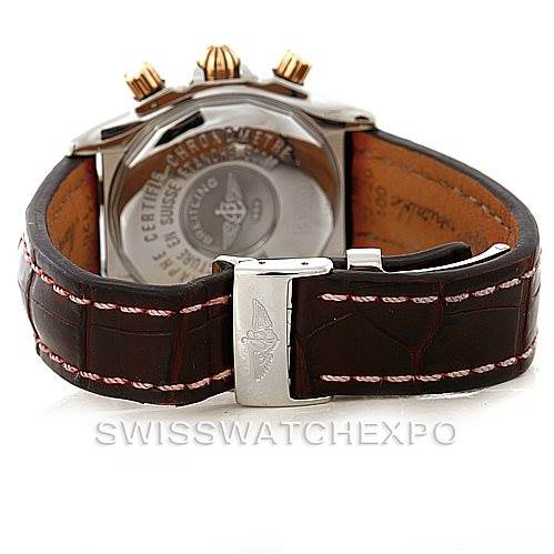The image shows the back view of a Breitling Chronomat C13356 Men's Steel and Gold (two tone) Burgundy Dial C13356 Men's Steel and Gold (two tone) Burgundy Dial watch with its leather strap and clasp visible.