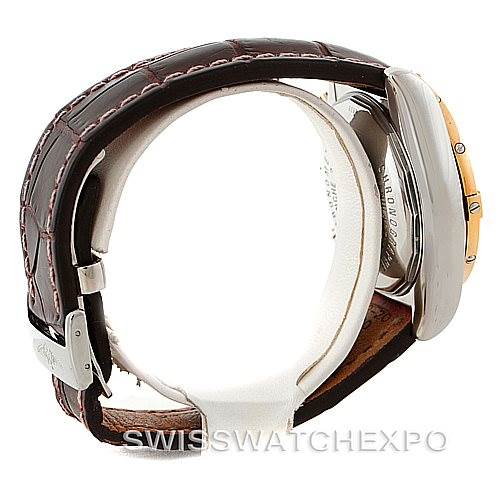 This image shows a side view of a Breitling Chronomat C13356 Men's Steel and Gold (two tone) Burgundy Dial C13356 Men's Steel and Gold (two tone) Burgundy Dial watch, focusing on the leather strap, buckle, and partially visible case and bezel.