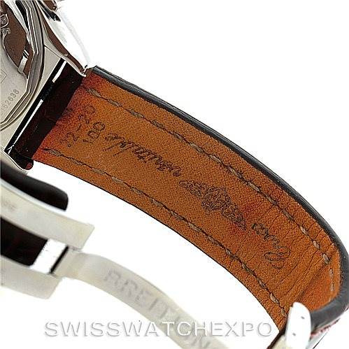 This image shows the side view of a Breitling Chronomat C13356 Men's Steel and Gold (two tone) Burgundy Dial C13356 Men's Steel and Gold (two tone) Burgundy Dial watch, focusing on the leather strap's inner side and clasp.