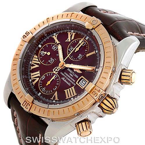 This image shows the face and side of a Breitling Chronomat C13356 Men's Steel and Gold (two tone) Burgundy Dial C13356 Men's Steel and Gold (two tone) Burgundy Dial watch, highlighting the dial, bezel, pushers, and crown with strap detail.