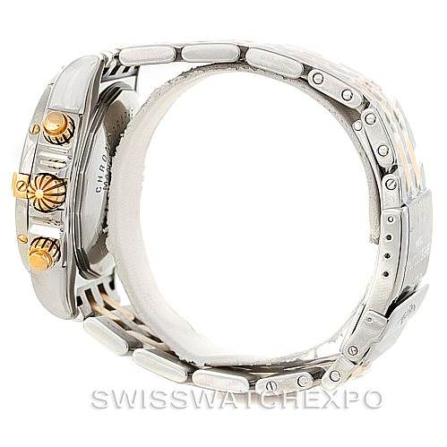 The image shows the side view of the Breitling Chronomat B13356 Men's Steel and Gold (two tone) Silver Dial B13356 Men's Steel and Gold (two tone) Silver Dial watch, highlighting the crown, pushers, and part of the bracelet.