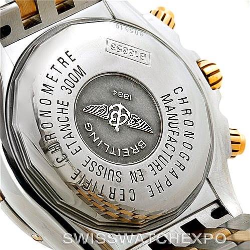 The image shows the case back of a Breitling Chronomat B13356 Men's Steel and Gold (two tone) Silver Dial B13356 Men's Steel and Gold (two tone) Silver Dial watch, highlighting the engravings and details.