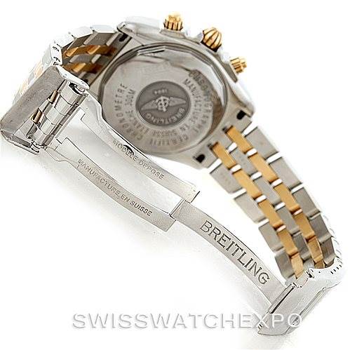 This image shows the back case, crown, and partially opened clasp of a Breitling Chronomat B13356 Men's Steel and Gold (two tone) Silver Dial B13356 Men's Steel and Gold (two tone) Silver Dial watch.