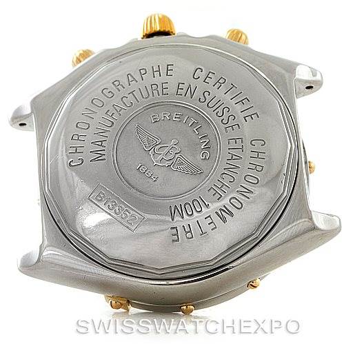 The image shows the case back of a Breitling Chronomat B13352 Men
s Steel and Gold (two tone) Black Dial B13352 Men
s Steel and Gold (two tone) Black Dial watch, highlighting the brand
s engraving and certification details.