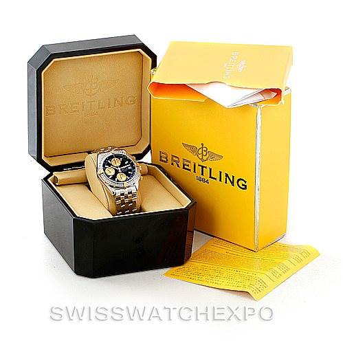 The Breitling Chronomat B13352 Men
s Steel and Gold (two tone) Black Dial B13352 Men
s Steel and Gold (two tone) Black Dial watch is displayed in its box, along with the outer packaging and documentation.