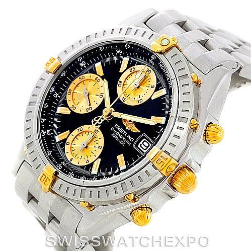 The image shows a Breitling Chronomat B13352 Men
s Steel and Gold (two tone) Black Dial B13352 Men
s Steel and Gold (two tone) Black Dial watch at an angled view highlighting the face, bezel, and part of the bracelet.