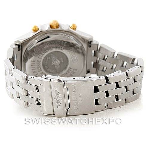 This image shows the back case and metal bracelet of a Breitling Chronomat B13352 Men
s Steel and Gold (two tone) Black Dial B13352 Men
s Steel and Gold (two tone) Black Dial watch from a rear angle.