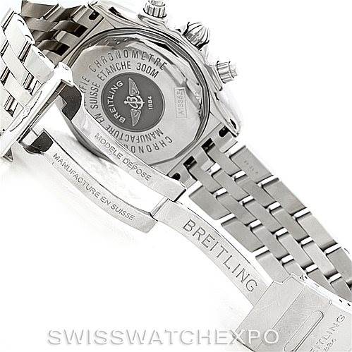 The image shows the back case and stainless steel bracelet clasp of a Breitling Chronomat A13356 Men
s Stainless Steel Grey Dial A13356 Men
s Stainless Steel Grey Dial watch, highlighting the engraved details.
