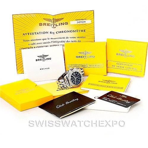 The Breitling Chronomat A13356 Men's Stainless Steel Grey Dial A13356 Men's Stainless Steel Grey Dial watch is displayed along with various certificates, manuals, and warranty cards in a top-down view.