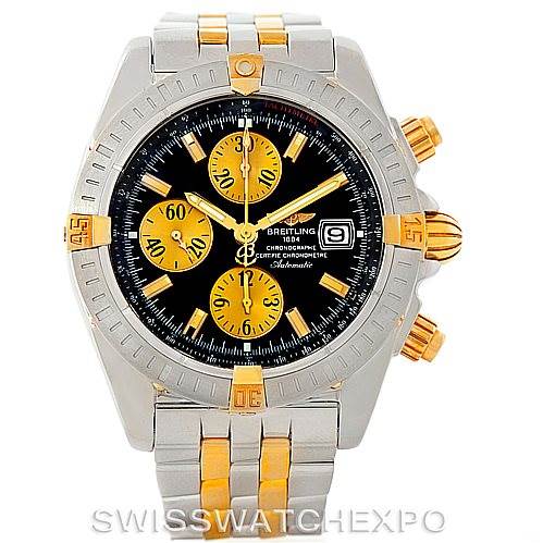 This image shows a frontal view of a Breitling Chronomat B13356 Men
s Steel and Gold (two tone) Black Dial B13356 Men
s Steel and Gold (two tone) Black Dial watch, highlighting its bezel, dial, subdials, crown, and bracelet.