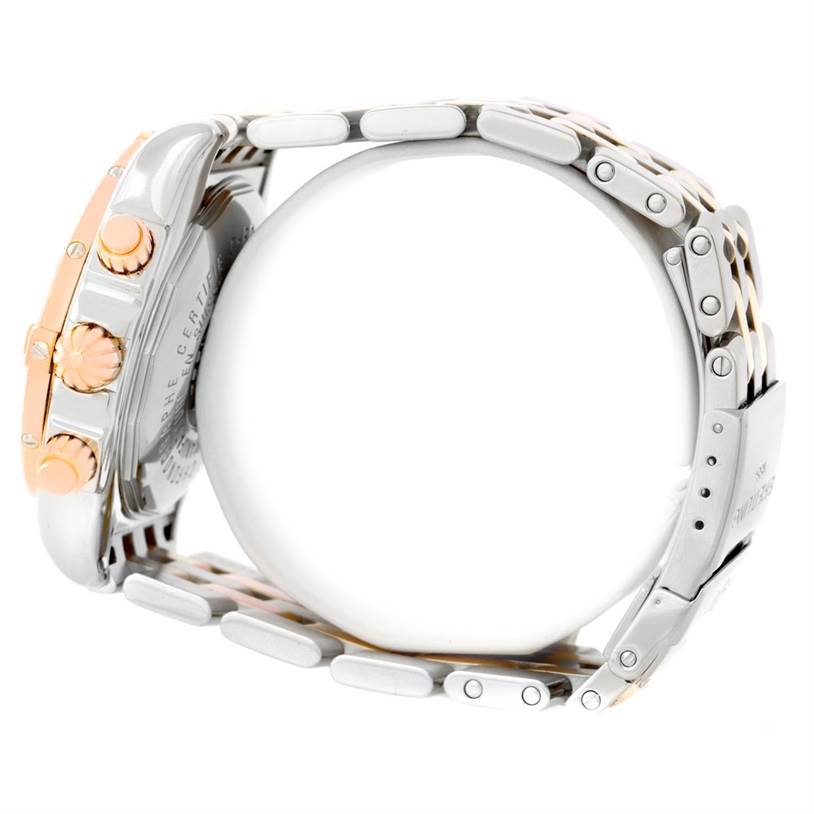 The image shows a side profile of the Breitling Chronomat C13356 Men's Steel and Gold (two tone) Burgundy Dial C13356 Men's Steel and Gold (two tone) Burgundy Dial watch, highlighting the crown, pushers, and two-tone bracelet.