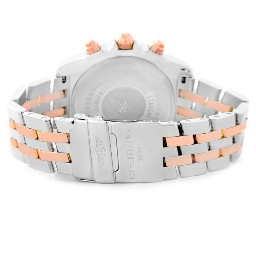 This image shows the clasp and backside of the Breitling Chronomat C13356 Men's Steel and Gold (two tone) Burgundy Dial C13356 Men's Steel and Gold (two tone) Burgundy Dial watch, highlighting its two-tone metal bracelet.