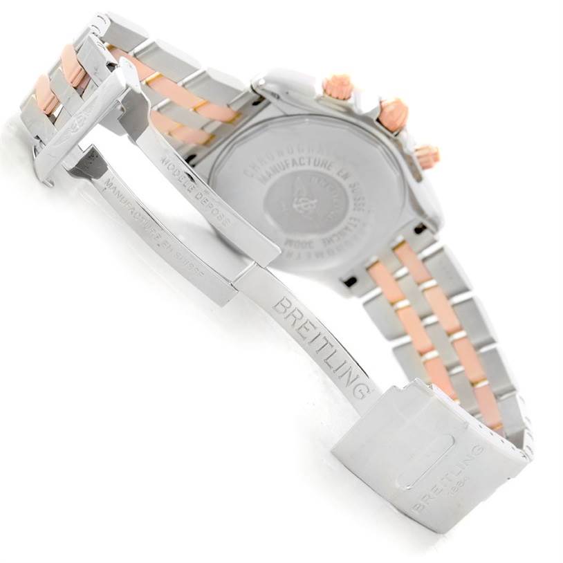 The image shows the back view and clasp of a Breitling Chronomat C13356 Men's Steel and Gold (two tone) Burgundy Dial C13356 Men's Steel and Gold (two tone) Burgundy Dial watch, including the metallic and rose-gold link bracelet.